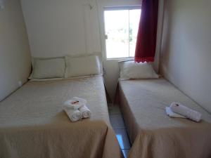 A bed or beds in a room at Pousada Bela Vista de Mateiros