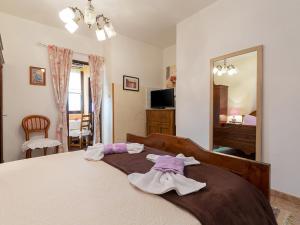 Postel nebo postele na pokoji v ubytování Apartments Vesna
