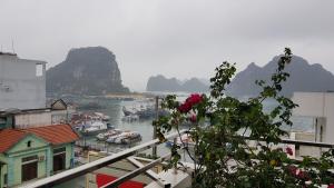 a view of a harbor with boats in the water at Hoàng Grand in Cái Rồng