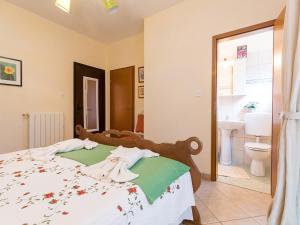 Postel nebo postele na pokoji v ubytování Apartments Vesna