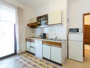 Kuchyň nebo kuchyňský kout v ubytování Apartments Vesna