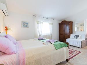 Postel nebo postele na pokoji v ubytování Apartments Vesna
