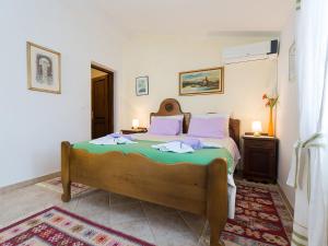 Postel nebo postele na pokoji v ubytování Apartments Vesna