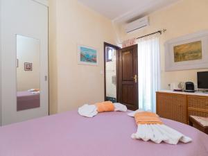 Postel nebo postele na pokoji v ubytování Apartments Vesna