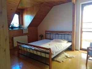 En eller flere senge i et værelse på Privát U čápů v Beskydech