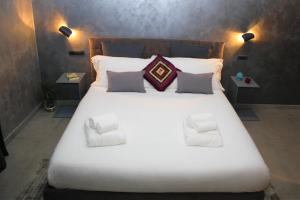 Posteľ alebo postele v izbe v ubytovaní suite28