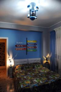 Postel nebo postele na pokoji v ubytování B&B Il MappaMondo