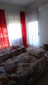 Postel nebo postele na pokoji v ubytování B&B Il MappaMondo
