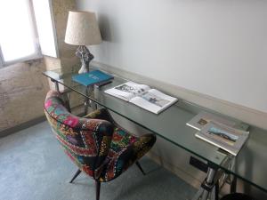Posezení v ubytování Une Chambre Chez Dupont