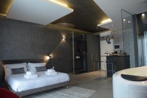 Posteľ alebo postele v izbe v ubytovaní suite28