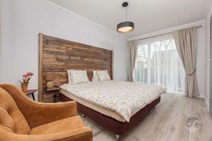 Łóżko lub łóżka w pokoju w obiekcie Apartament Natura I