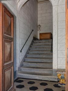 a staircase in a building with a stair case at Villa Eugenia in Livorno