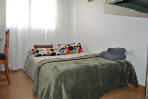 A bed or beds in a room at KHORS