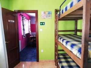 Postel nebo postele na pokoji v ubytování Casa Los Maestros