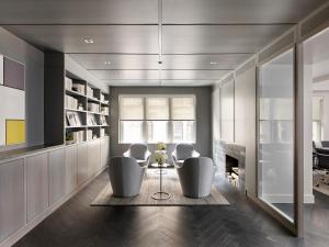 a living room with chairs and a fireplace at AKA Rittenhouse Square in Philadelphia +54 photos