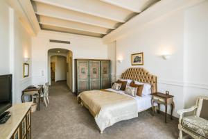 Cama o camas de una habitación en Majestic Hotel