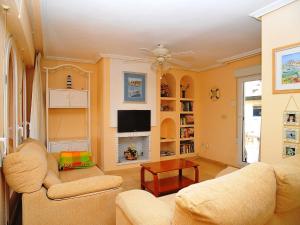 A television and/or entertainment centre at Apartment San Esteban-1 by Interhome