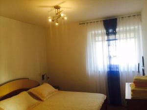 Postel nebo postele na pokoji v ubytování Apartman Nekic
