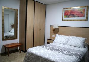 Postel nebo postele na pokoji v ubytování Hotel Carabela 2