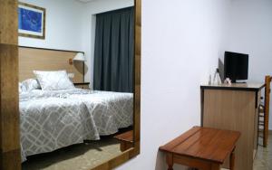Postel nebo postele na pokoji v ubytování Hotel Carabela 2