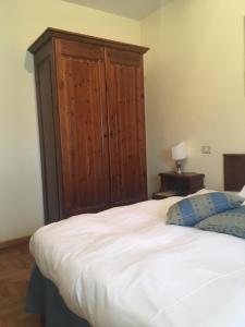 Postel nebo postele na pokoji v ubytování Hotel Belvedere Dolomiti