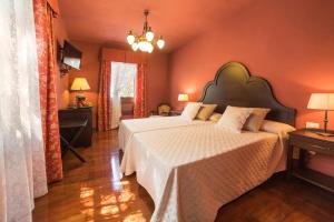 Posteľ alebo postele v izbe v ubytovaní Hotel Emblemático San Marcos
