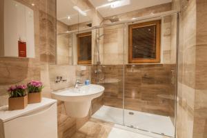 Kúpeľňa v ubytovaní ApartSerwis - Apartament Zacisze