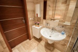 Kúpeľňa v ubytovaní ApartSerwis - Apartament Zacisze