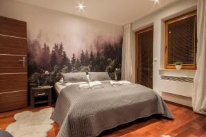 Posteľ alebo postele v izbe v ubytovaní ApartSerwis - Apartament Zacisze