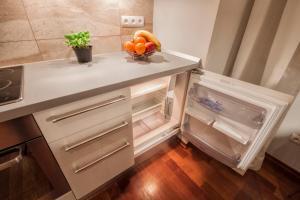 Kuchyňa alebo kuchynka v ubytovaní ApartSerwis - Apartament Zacisze