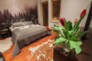 Posteľ alebo postele v izbe v ubytovaní ApartSerwis - Apartament Zacisze
