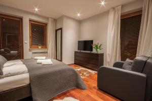 Posteľ alebo postele v izbe v ubytovaní ApartSerwis - Apartament Zacisze