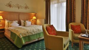 Postel nebo postele na pokoji v ubytování Hotel Rebstock