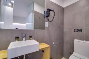 Kúpeľňa v ubytovaní athensotel