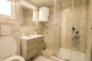 Phòng tắm tại Apartments Family Roso