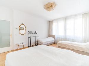 Кровать или кровати в номере Ferhadija Premium Apartment