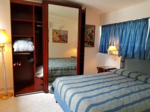 Кровать или кровати в номере Villa Kalimera
