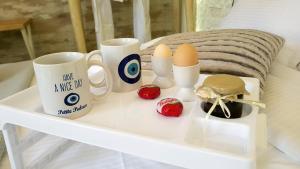 Posteľ alebo postele v izbe v ubytovaní Petite Palace Aristotelous 8