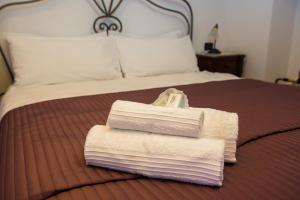 Postel nebo postele na pokoji v ubytování B&B I Pini Di Storaco