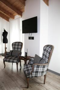 TV a/nebo společenská místnost v ubytování B&B Rocambola + 37 fotografií