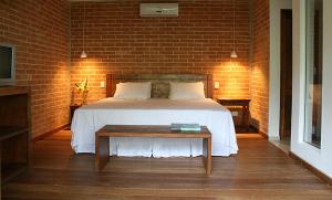 Llit o llits en una habitació de Flat Camburi