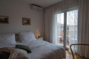Postel nebo postele na pokoji v ubytování Guest house Lana