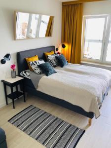 Posteľ alebo postele v izbe v ubytovaní AQUAMARINA ONYX GOLD
