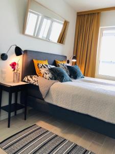 Posteľ alebo postele v izbe v ubytovaní AQUAMARINA ONYX GOLD