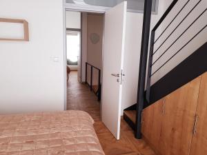 Postel nebo postele na pokoji v ubytování G.apartment's Klínovec