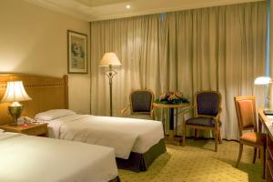 Postel nebo postele na pokoji v ubytování BEST WESTERN PLUS Hotel Hong Kong