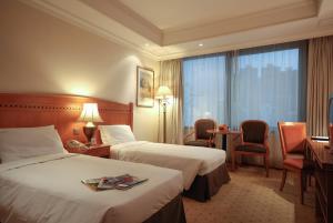 Postel nebo postele na pokoji v ubytování BEST WESTERN PLUS Hotel Hong Kong