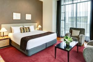 Letto o letti in una camera di Rendezvous Heritage Hotel Auckland