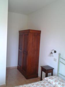Postel nebo postele na pokoji v ubytování Agriturismo Norianino