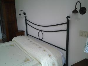 Postel nebo postele na pokoji v ubytování Agriturismo Norianino